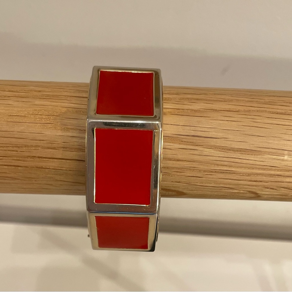 Vintage Gold Tone Metal Hinged Bracelet with Red Enamel Inlay